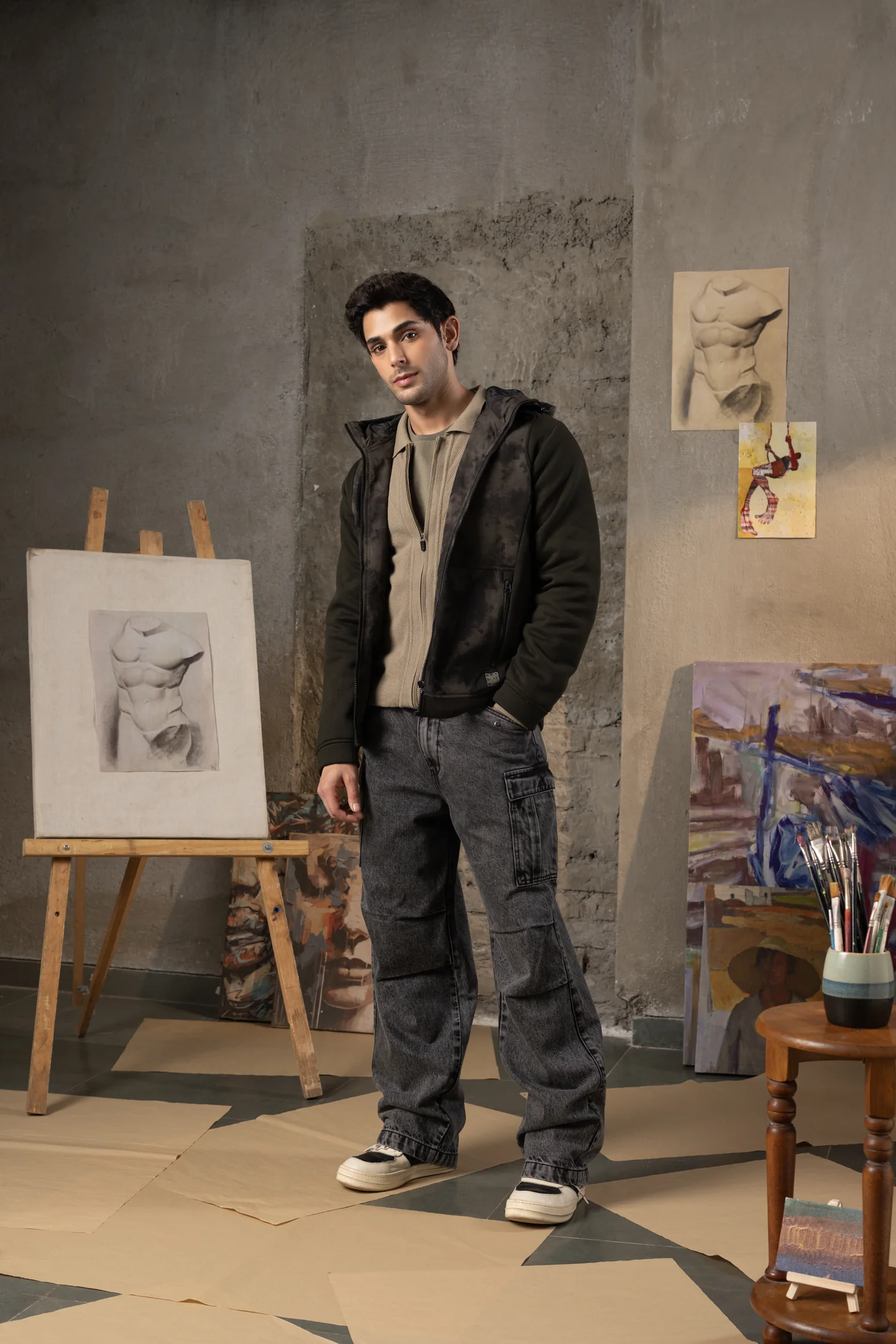 Dark textured hoodie over a taupe knit