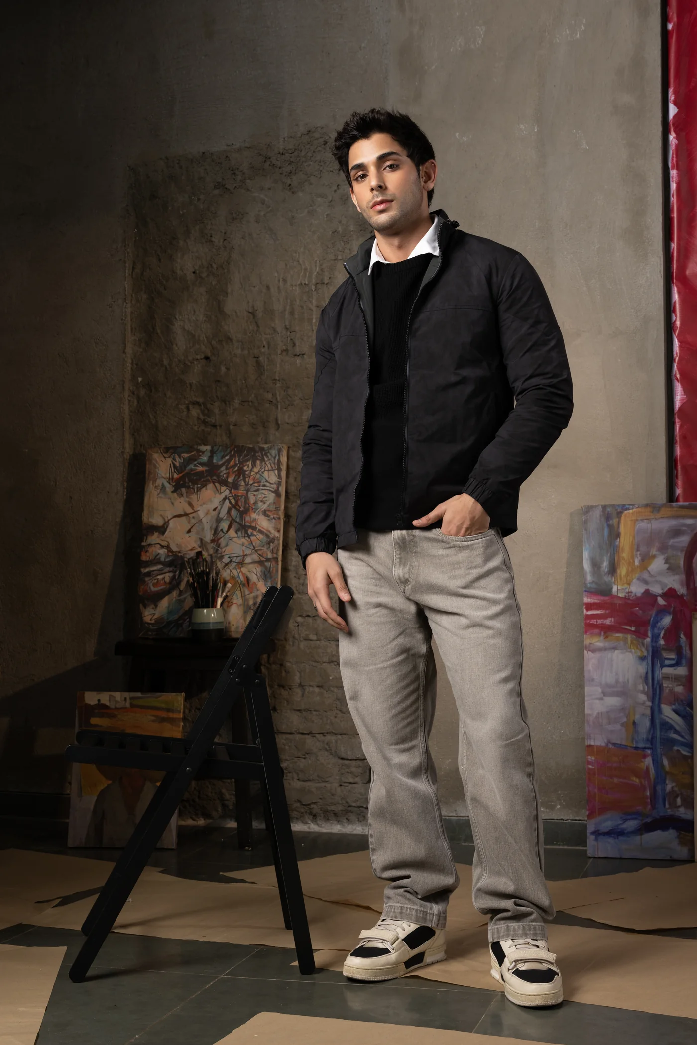 Black winter layers with stone trousers