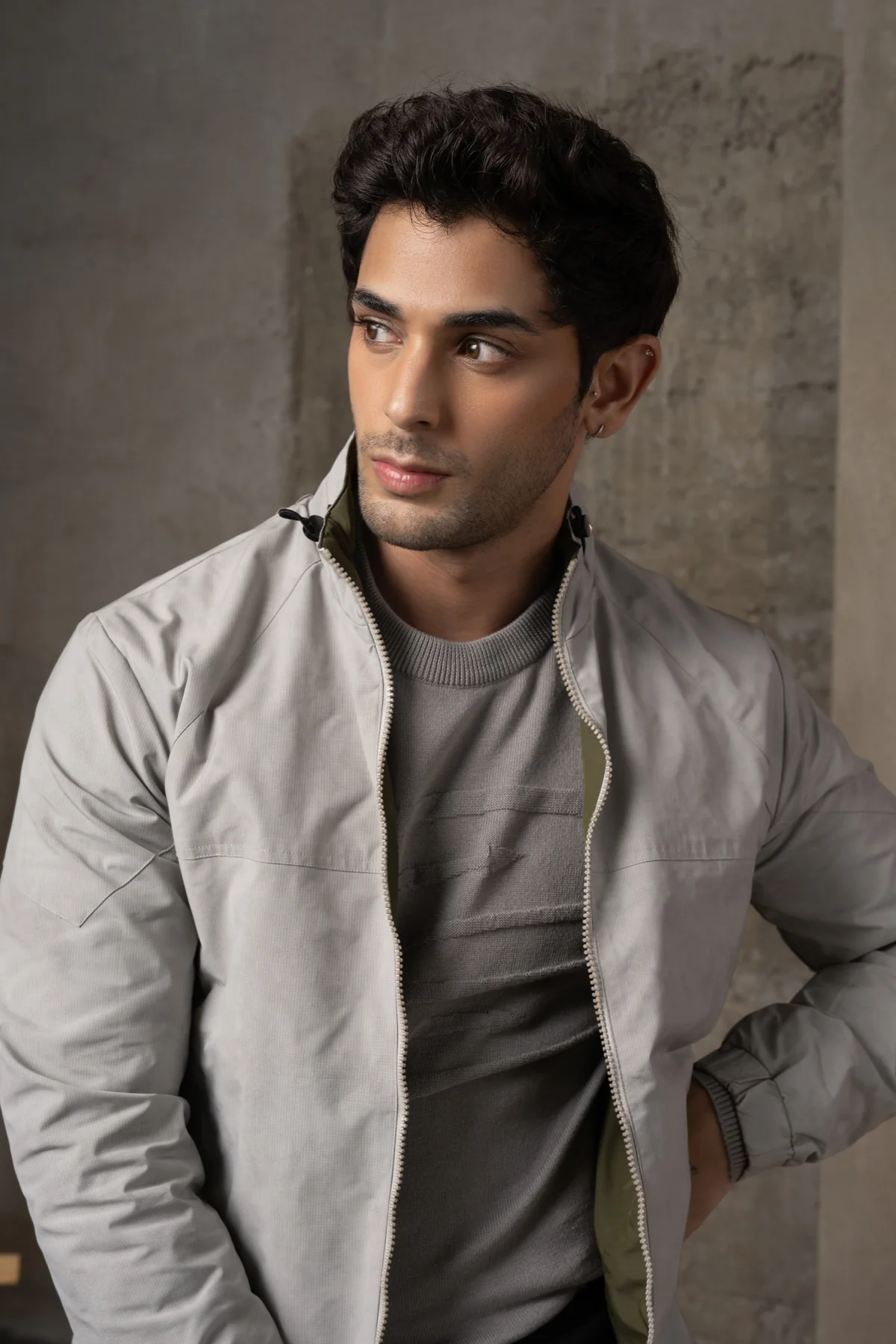 Portrait detail of the silver grey jacket