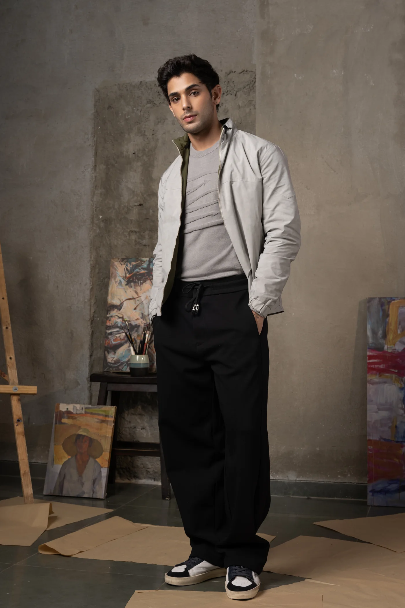 Silver grey jacket with black relaxed trousers