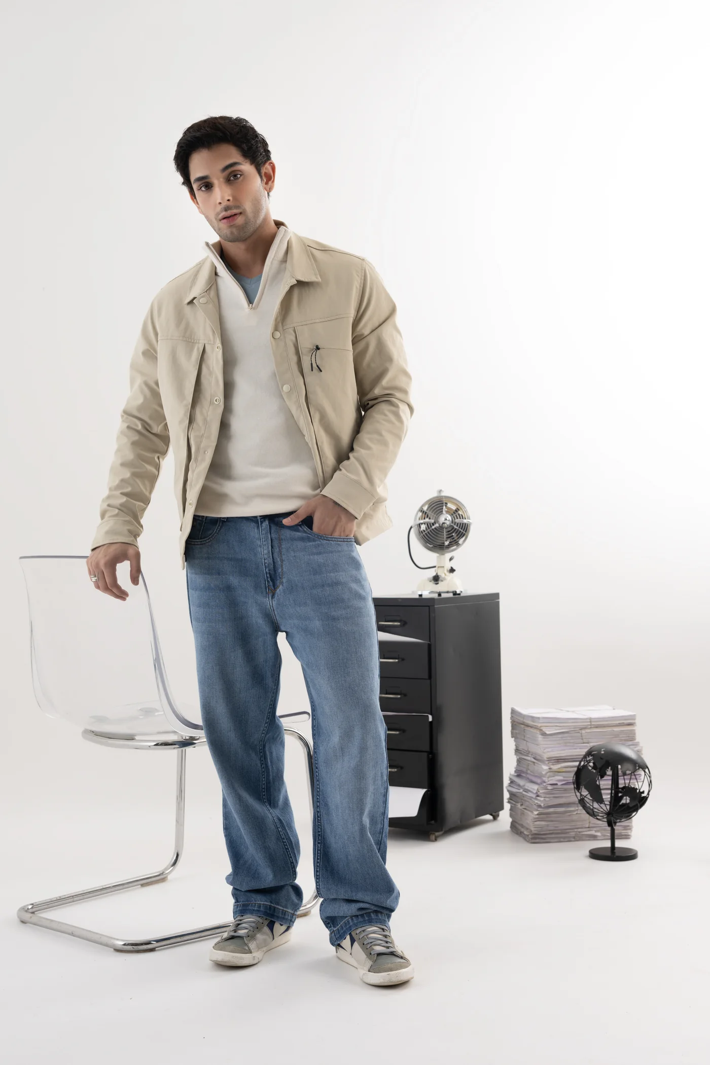 Oatmeal jacket with a cream knit and washed denim